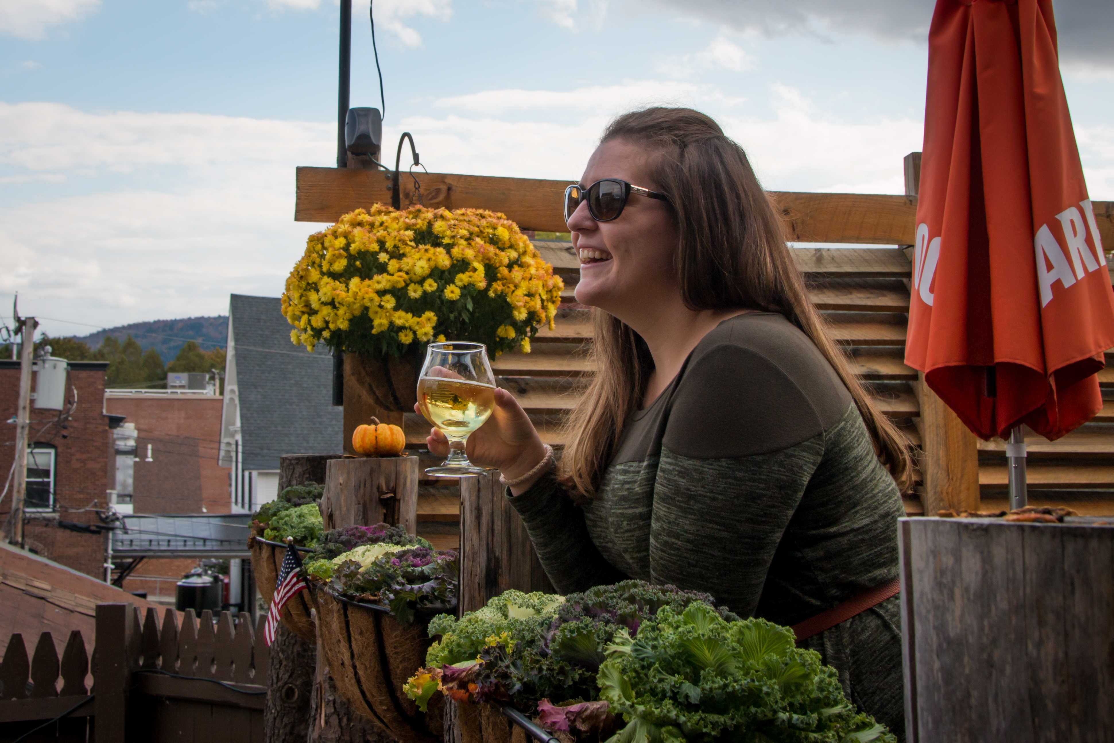 Enjoying a drink on the patio of The Reservoir, photo by Heather Glenn Photography