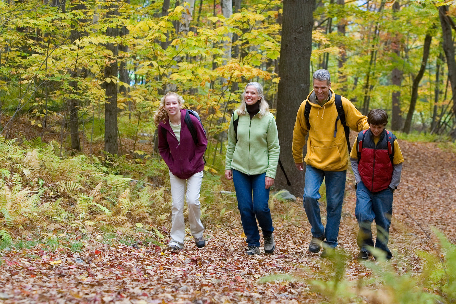 Family hiking in fall