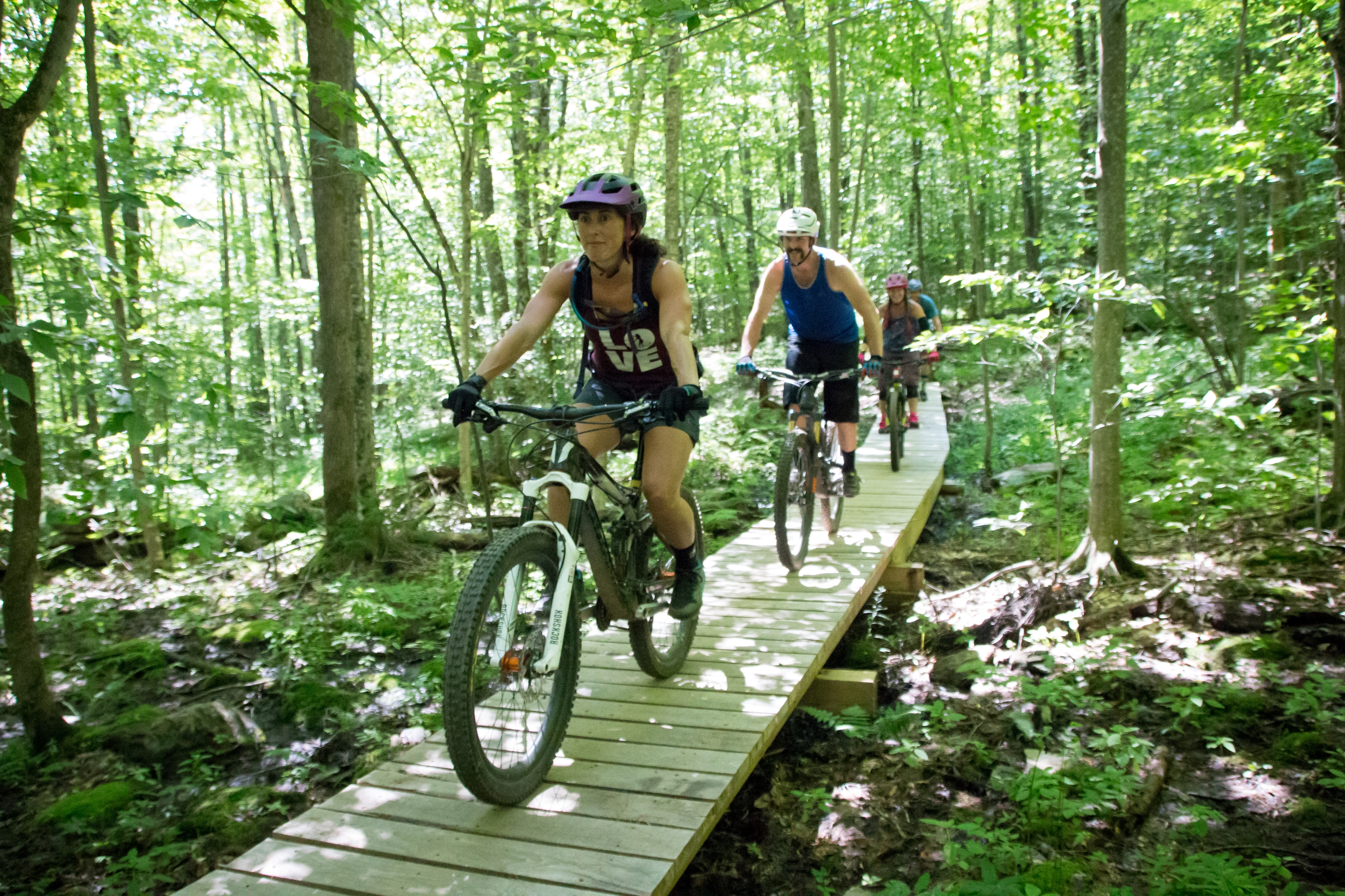 Bikers on a boardwalk in Waterbury