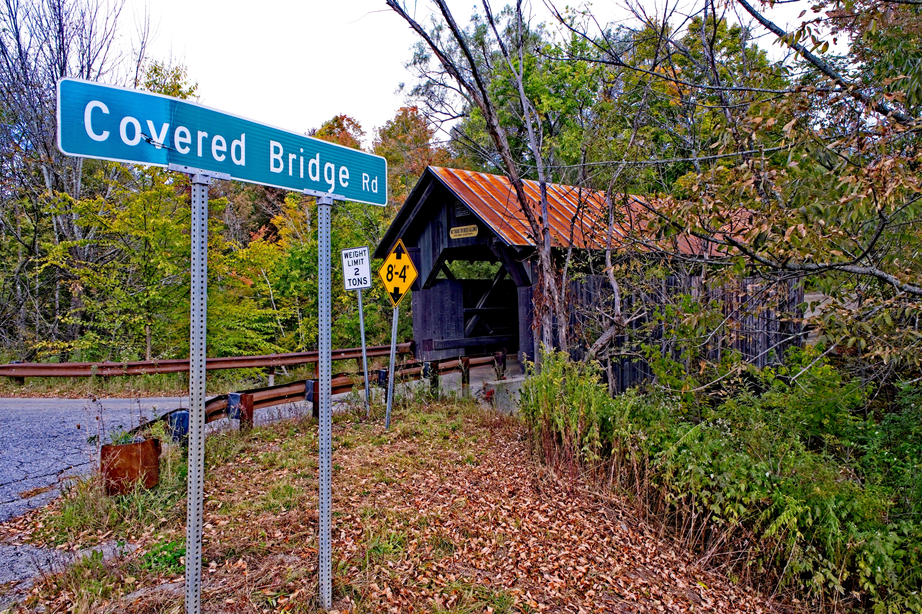 A covered bridge along a scenic drive